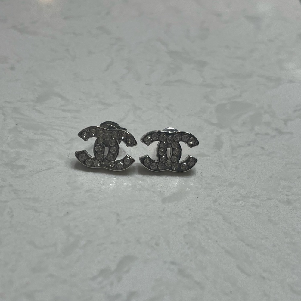 Authentic vintage Chanel CC silver earrings.